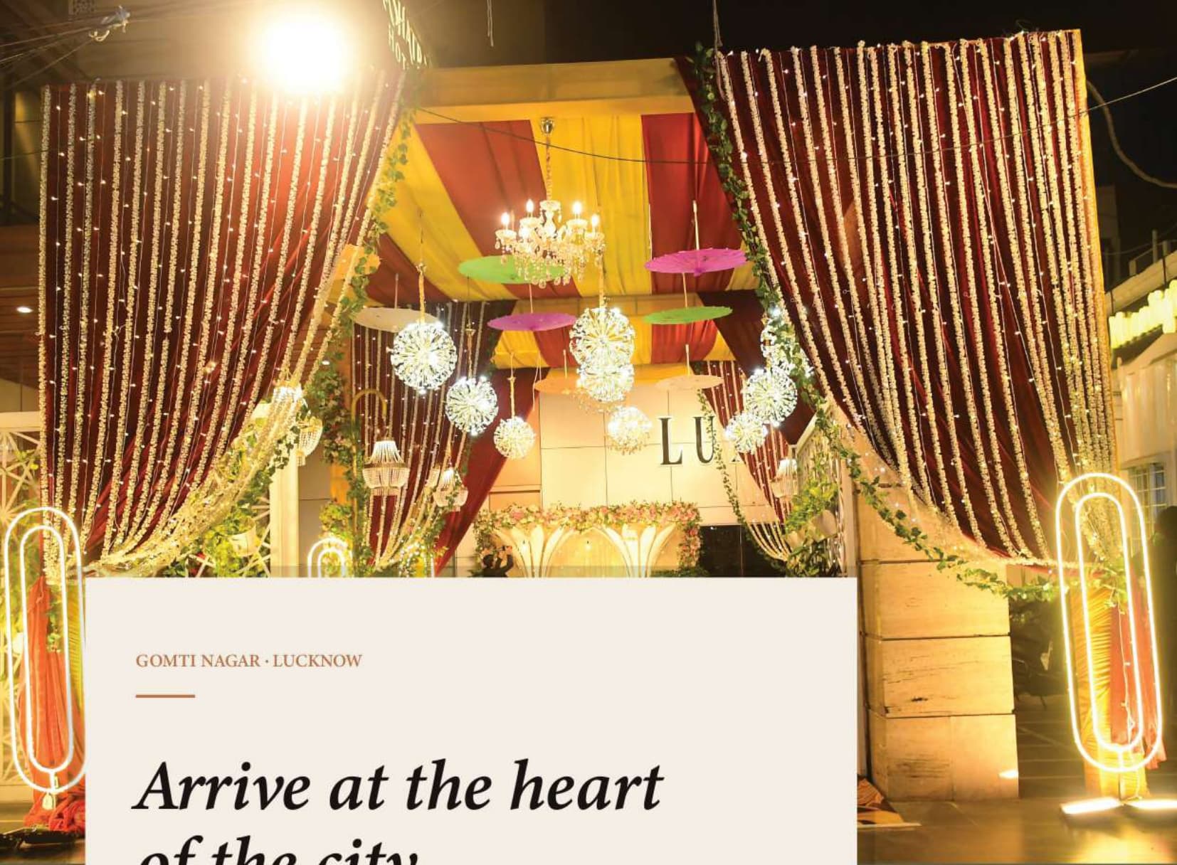 Nakshatra Hotel Grand Night Entrance with Illuminated Floral Canopy